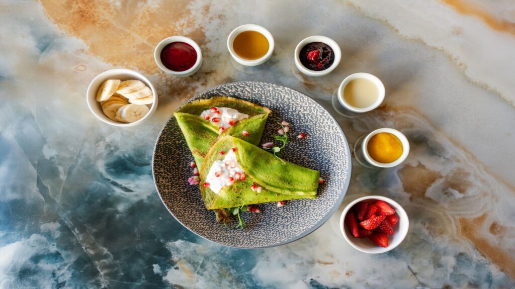 Spinach Pancakes with Cream & Raspberry Jam